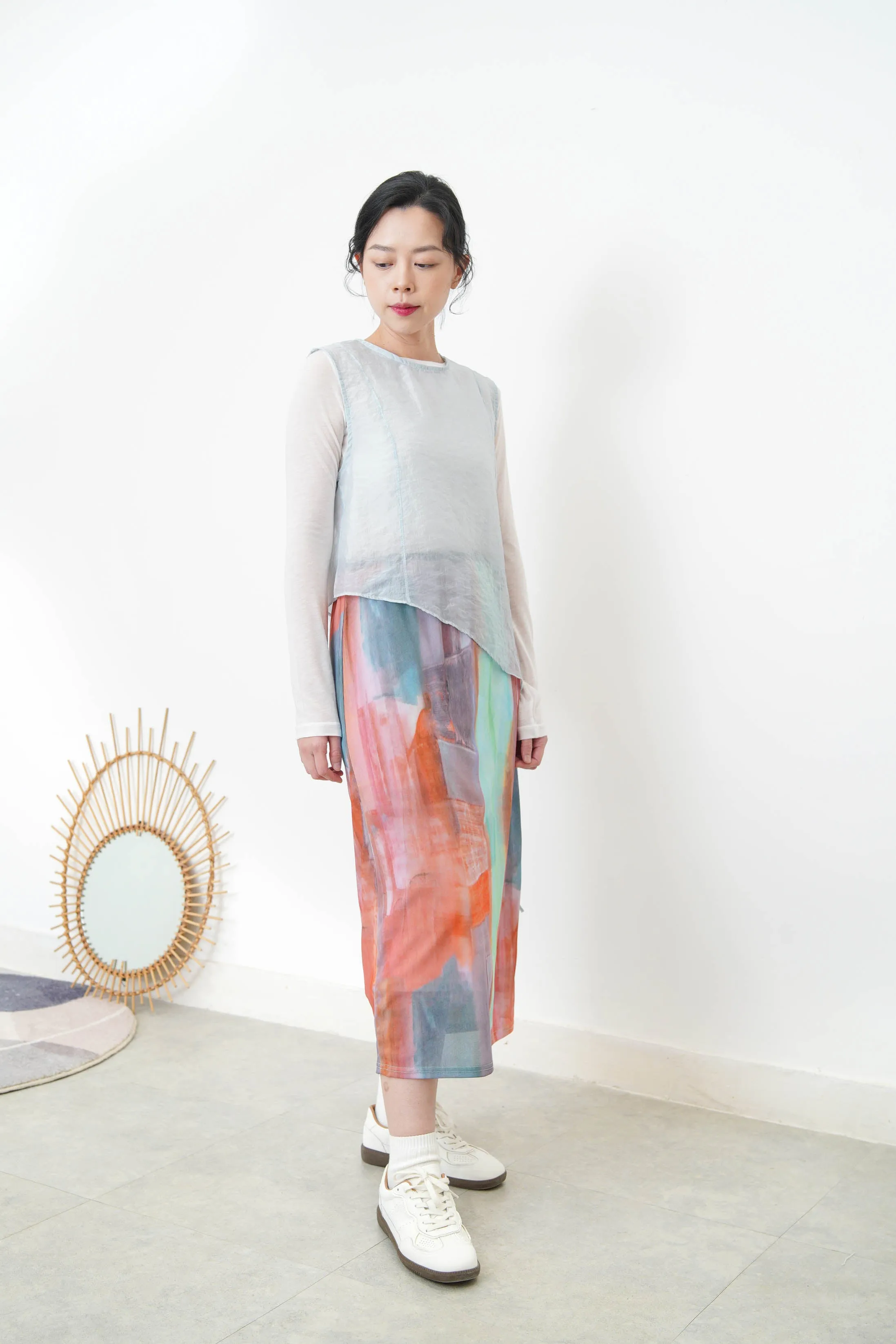Baby blue sheer vest in asymmetrical cut