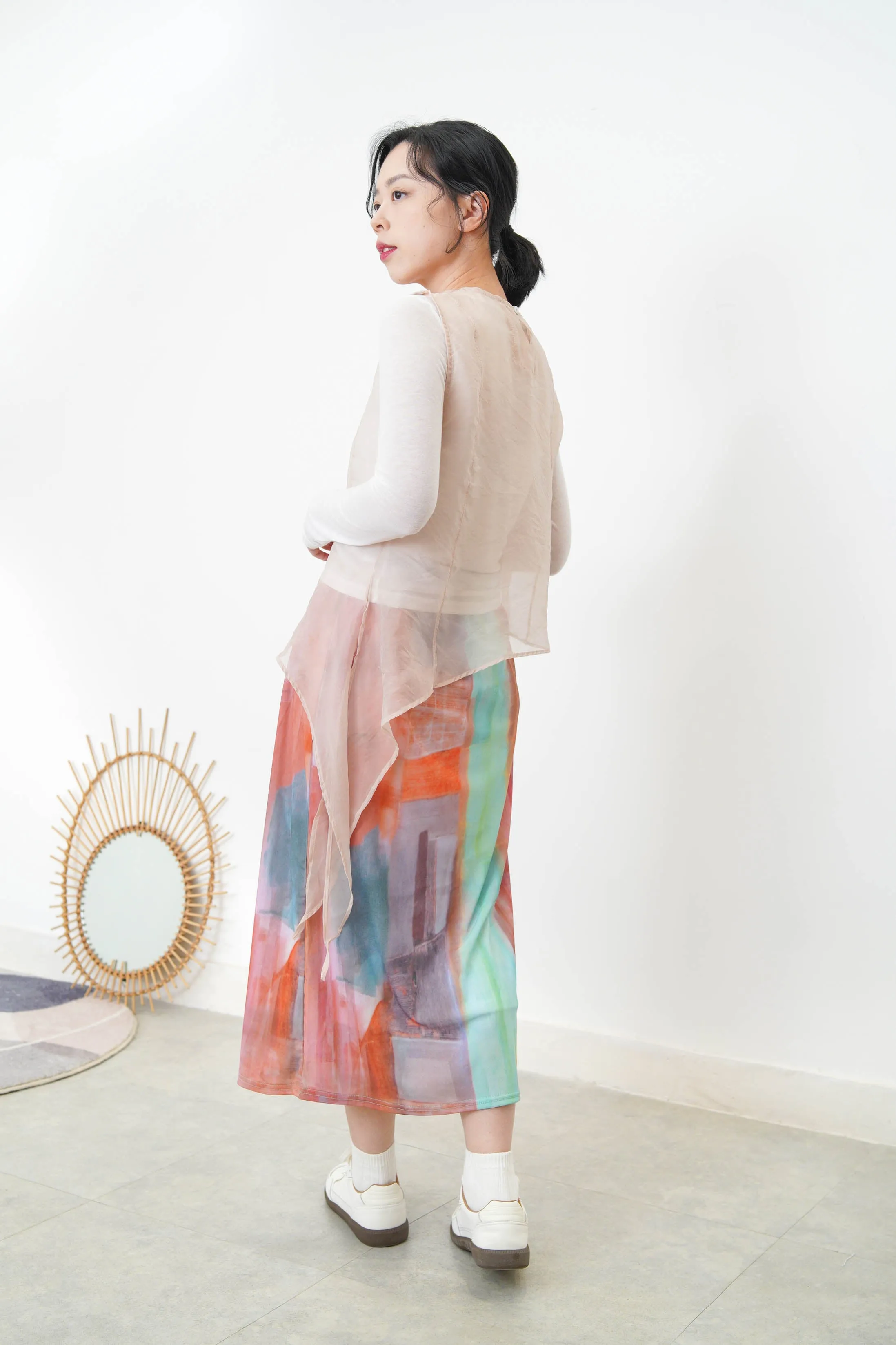 Baby blue sheer vest in asymmetrical cut