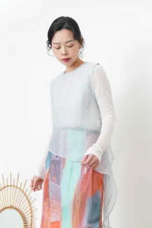 Baby blue sheer vest in asymmetrical cut