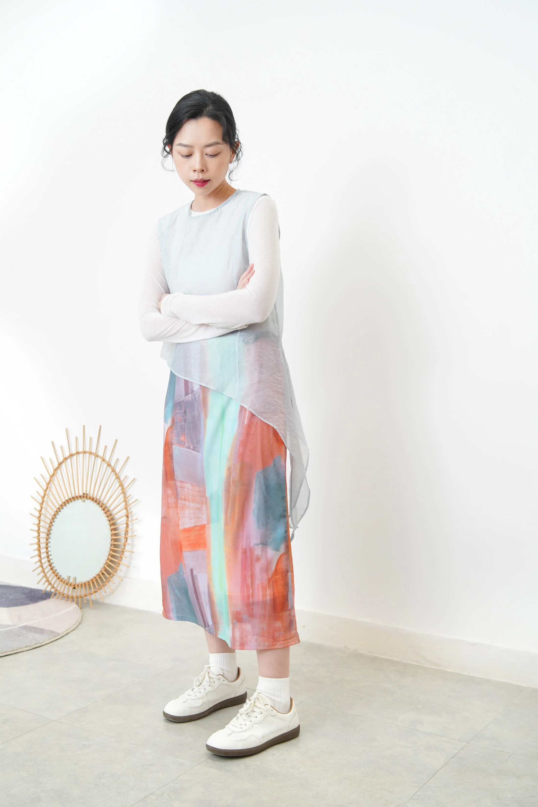 Baby blue sheer vest in asymmetrical cut
