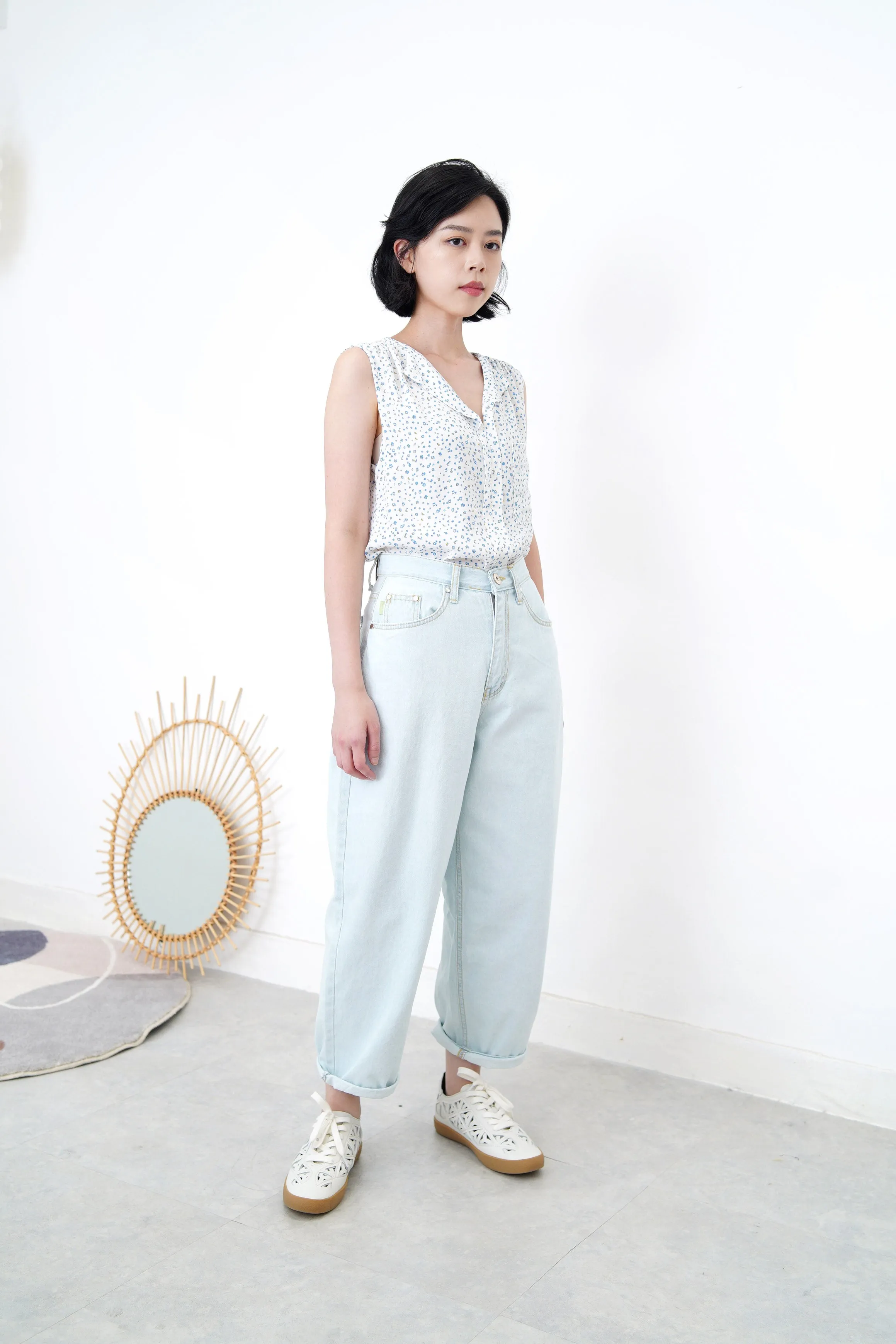 Light blue floral v neck vest