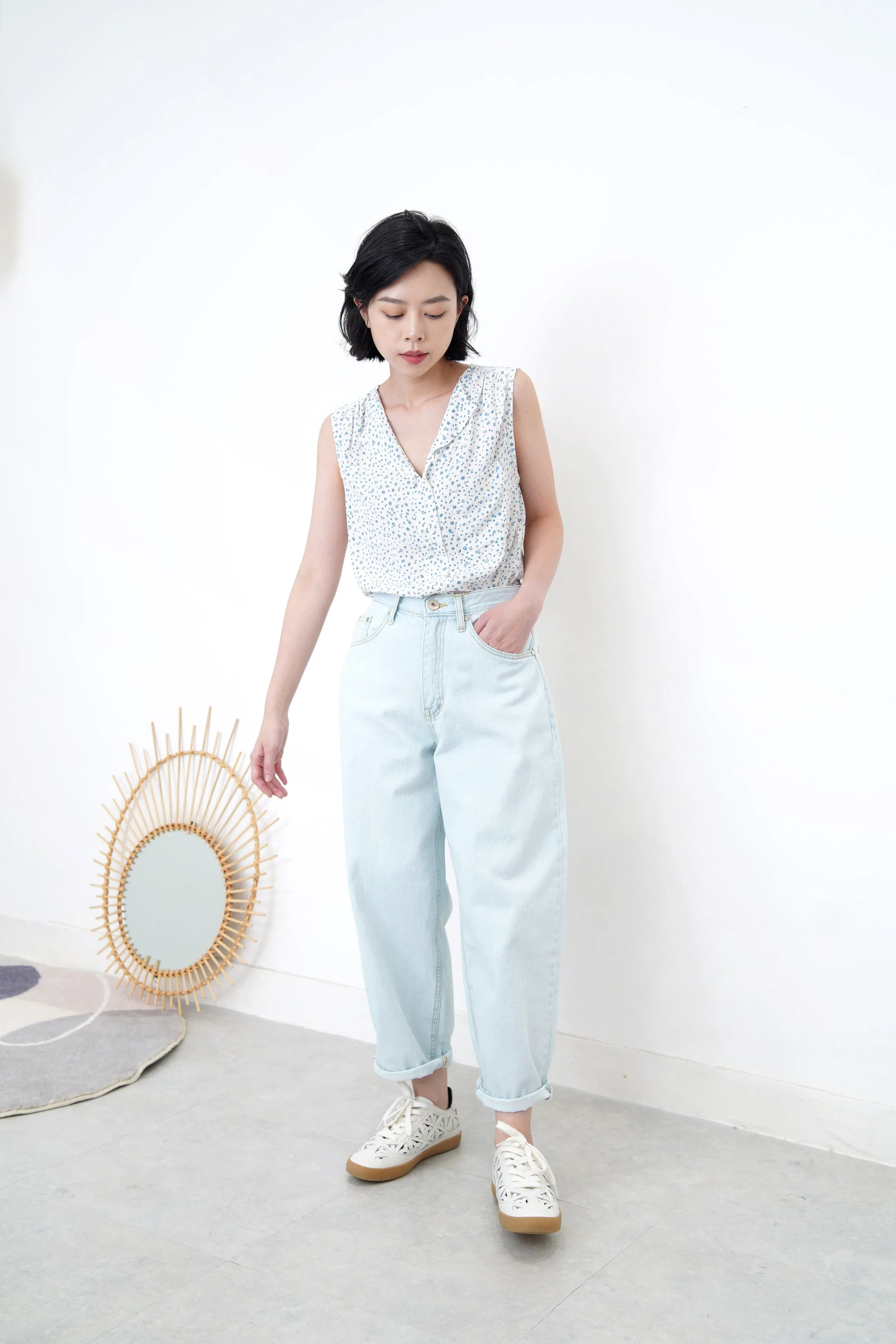 Light blue floral v neck vest